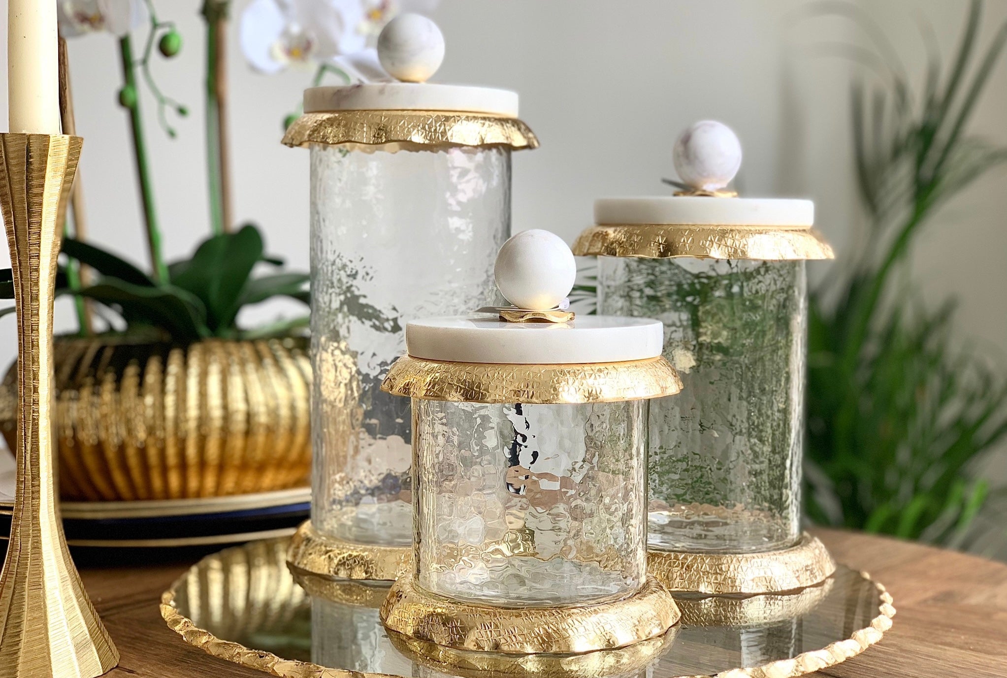 glass coffee canister with gold ruffle detail and marble lids