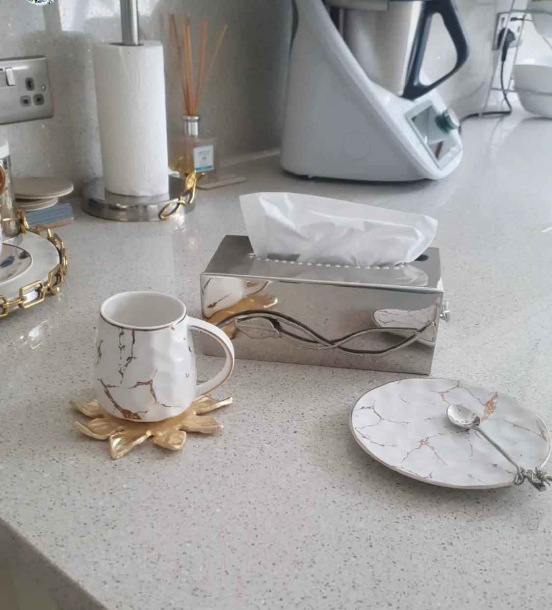 homeware marble look plate anf mug on kitchen countertop