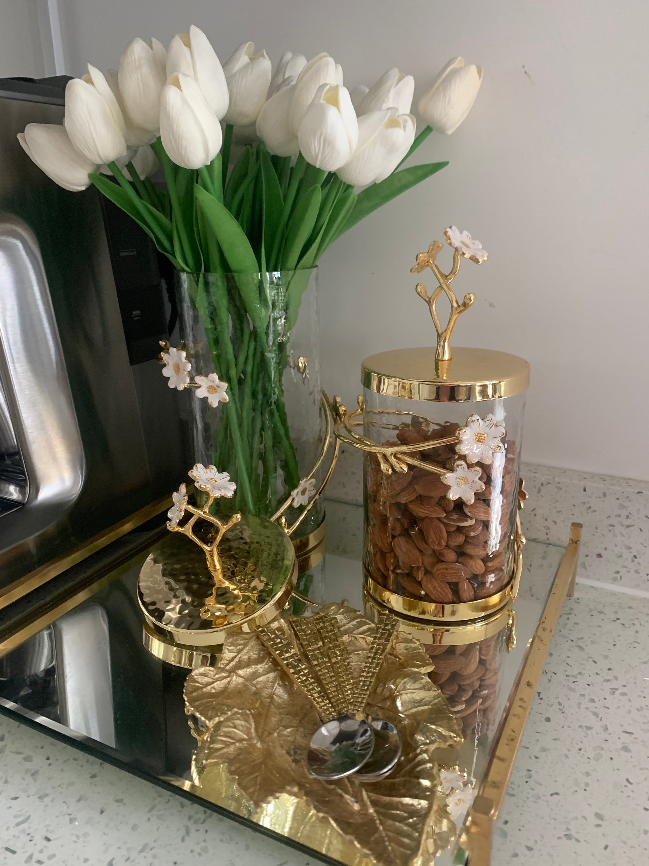 Glass jars with gold metal design used for home decor