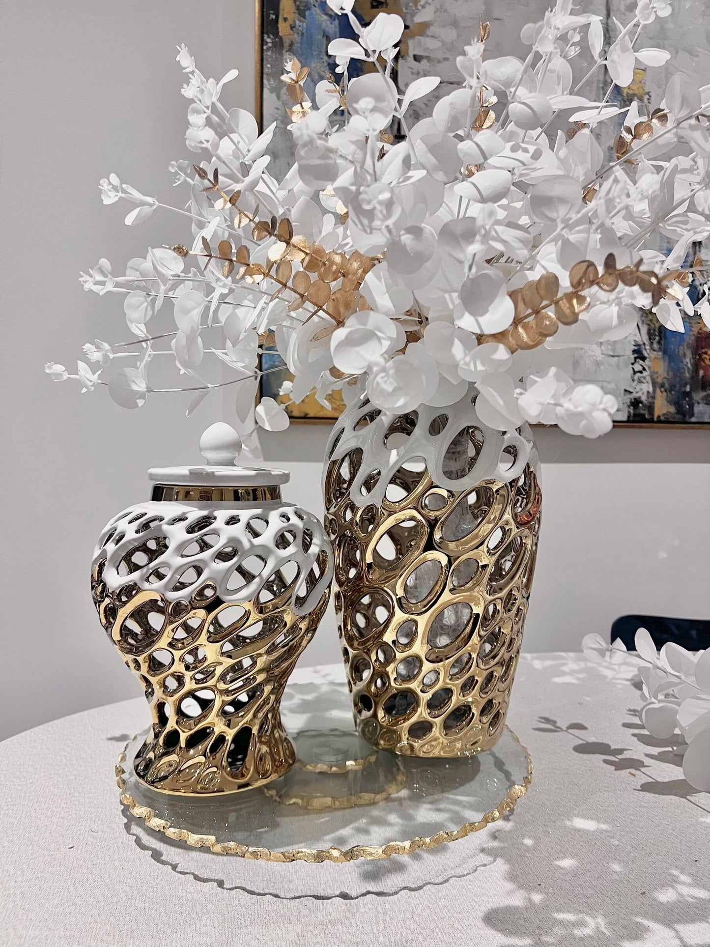 gold vase with white and insert design