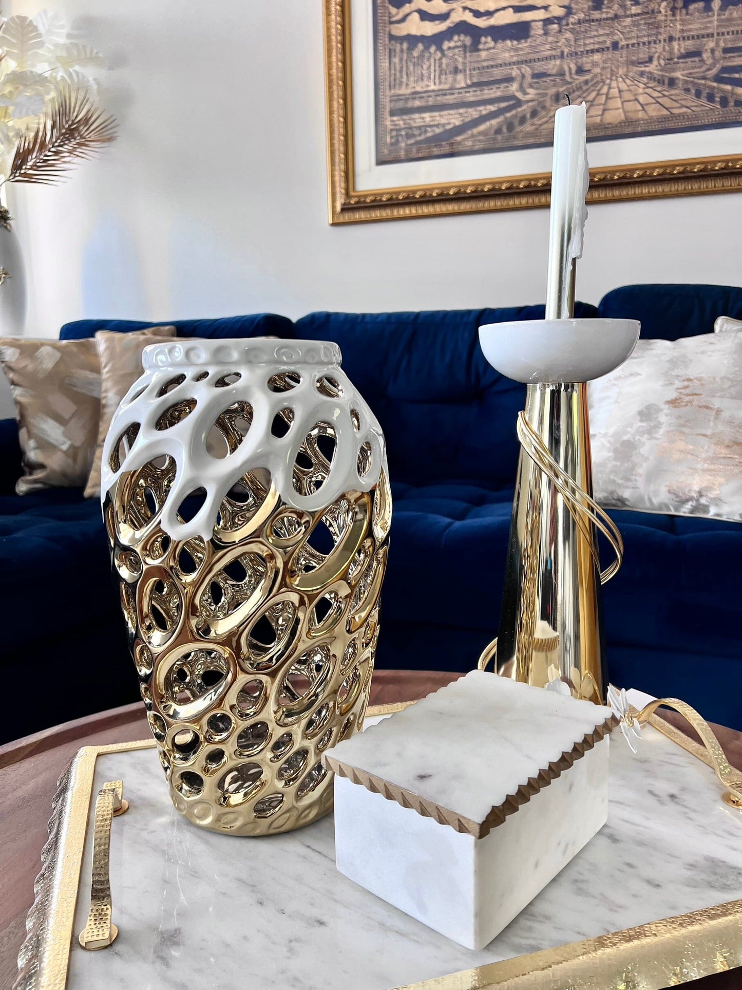 white gold vase for flowers placed on marble tray gold edges home living room