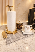 Gold leaf kitchen roll holder on marble worktop | High Class Touch UK