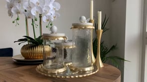 Rotating glass tray with glass coffee kitchen canisters